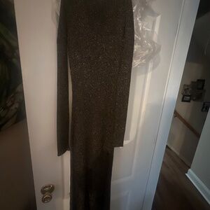 Black knit, long cold shoulder stretchy, but fitted elegant cocktail dress
